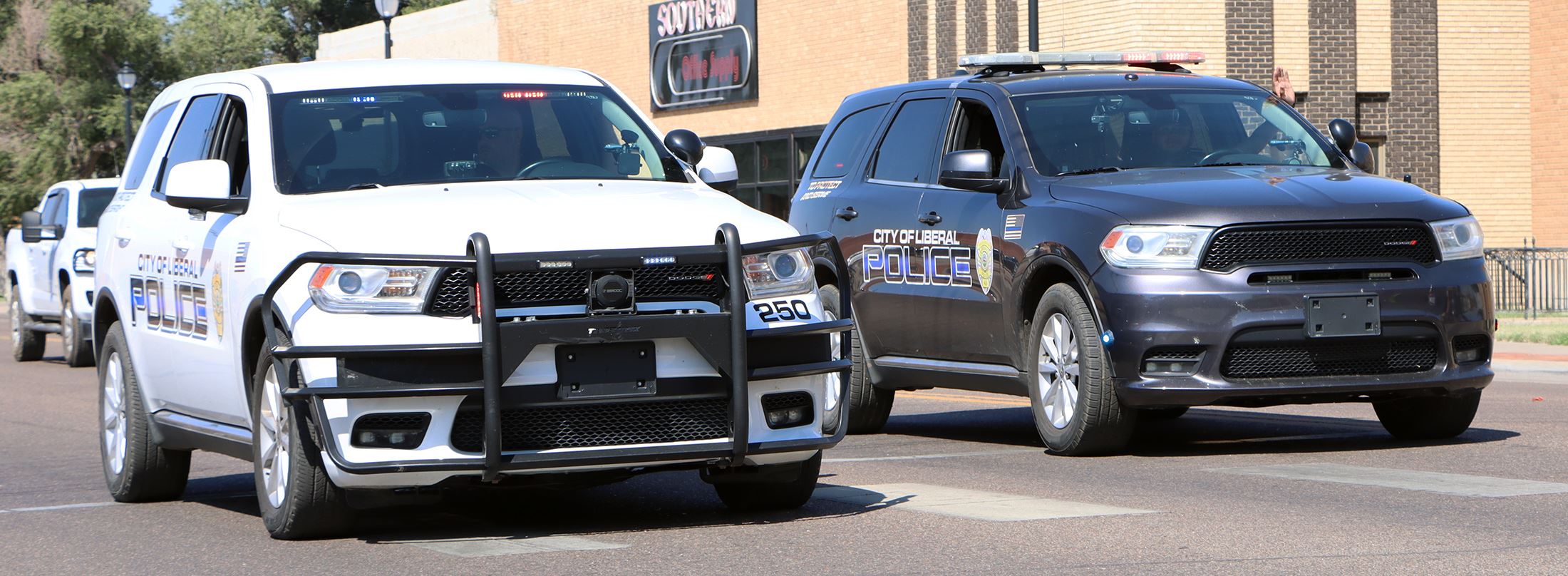 Liberal Police cruisers driving